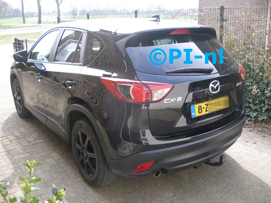 Parkeersensoren (set E 2018) ingebouwd door PI-nl in een Mazda CX-5 uit 2015. De pieper werd verstopt.